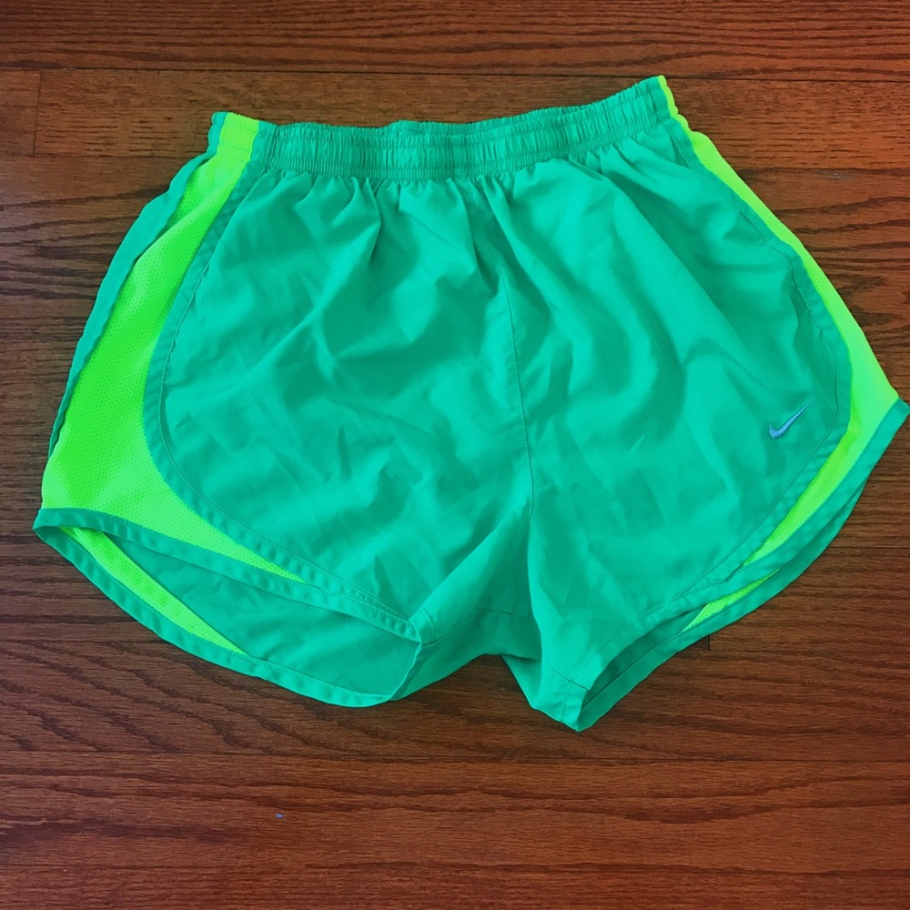 light green Nike running shorts